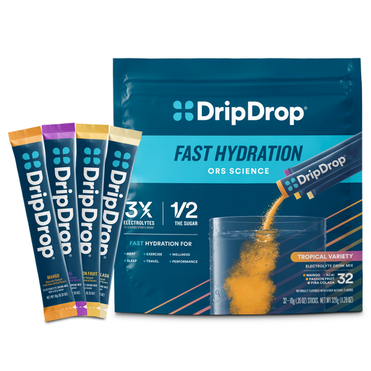 dripdrop-tropical-variety-pack-electrolyte-powder-8-oz-sticks-32-count-k9 Tropical_Variety_-_32ct_-_Transparent.png